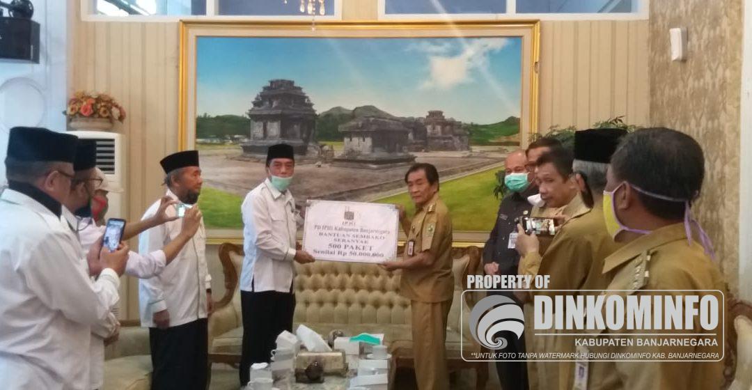 Baznas dan IPHI Salurkan Paket Sembako untuk Masyarakat